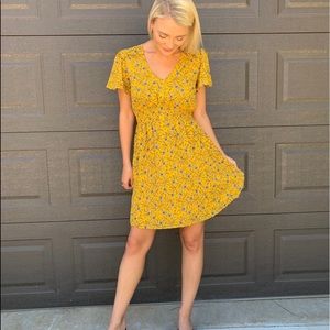 Dress with cinched waist.